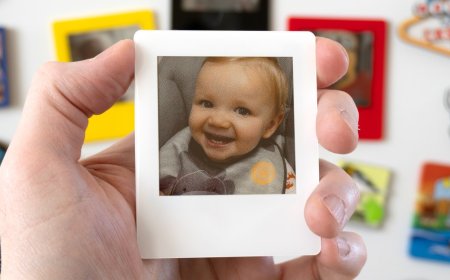 These reusable digital Polaroids are a clever way to cover a fridge in memories